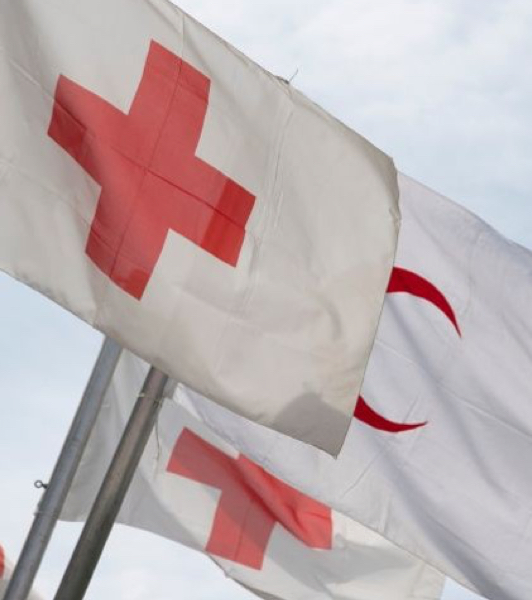 Flags of the Red Cross and Red Crescent.
